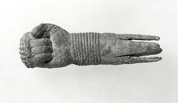 Object in the form of clenched fist 4.33 x 1.38 in. (11 x 3.51 cm)